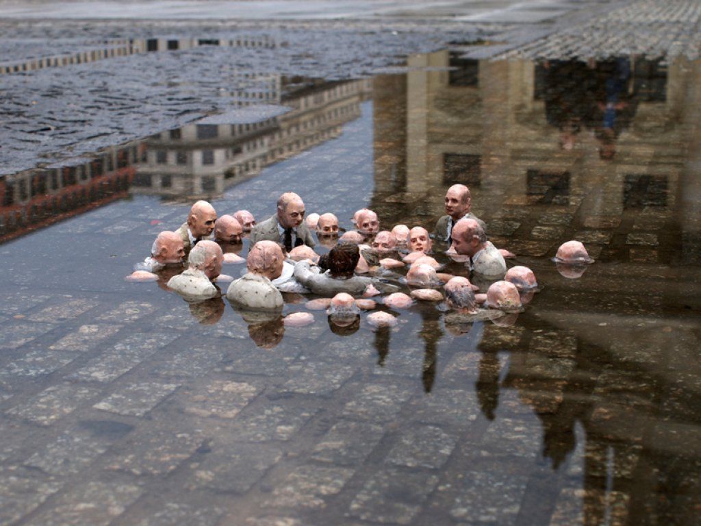 image: installation follow the leaders politicians discussing climate change in berlin germany 2011 by isaac cordal
